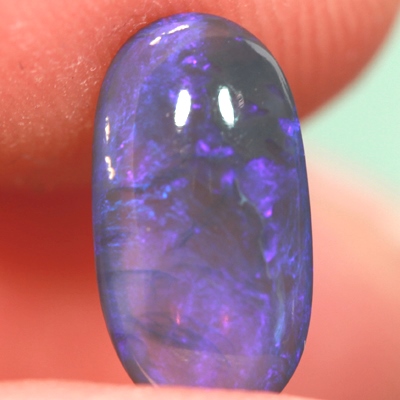SOLID BLACK CRYSTAL OPAL Lots of purple fire always